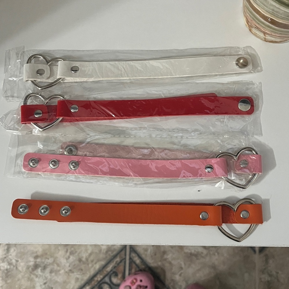 Set of Heart Buckle Belts in Red, Pink, White, and Orange